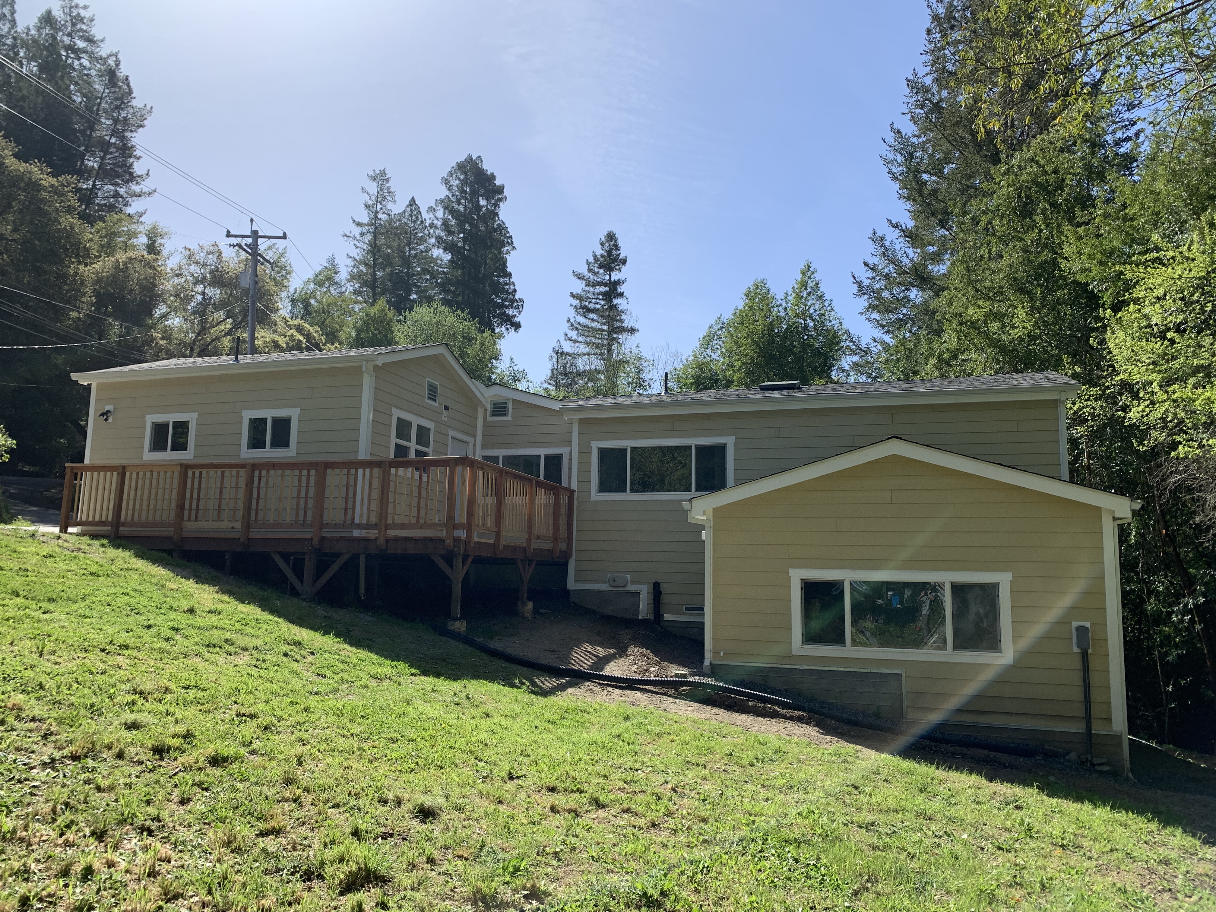 Finished rear exterior and deck at Doug's House