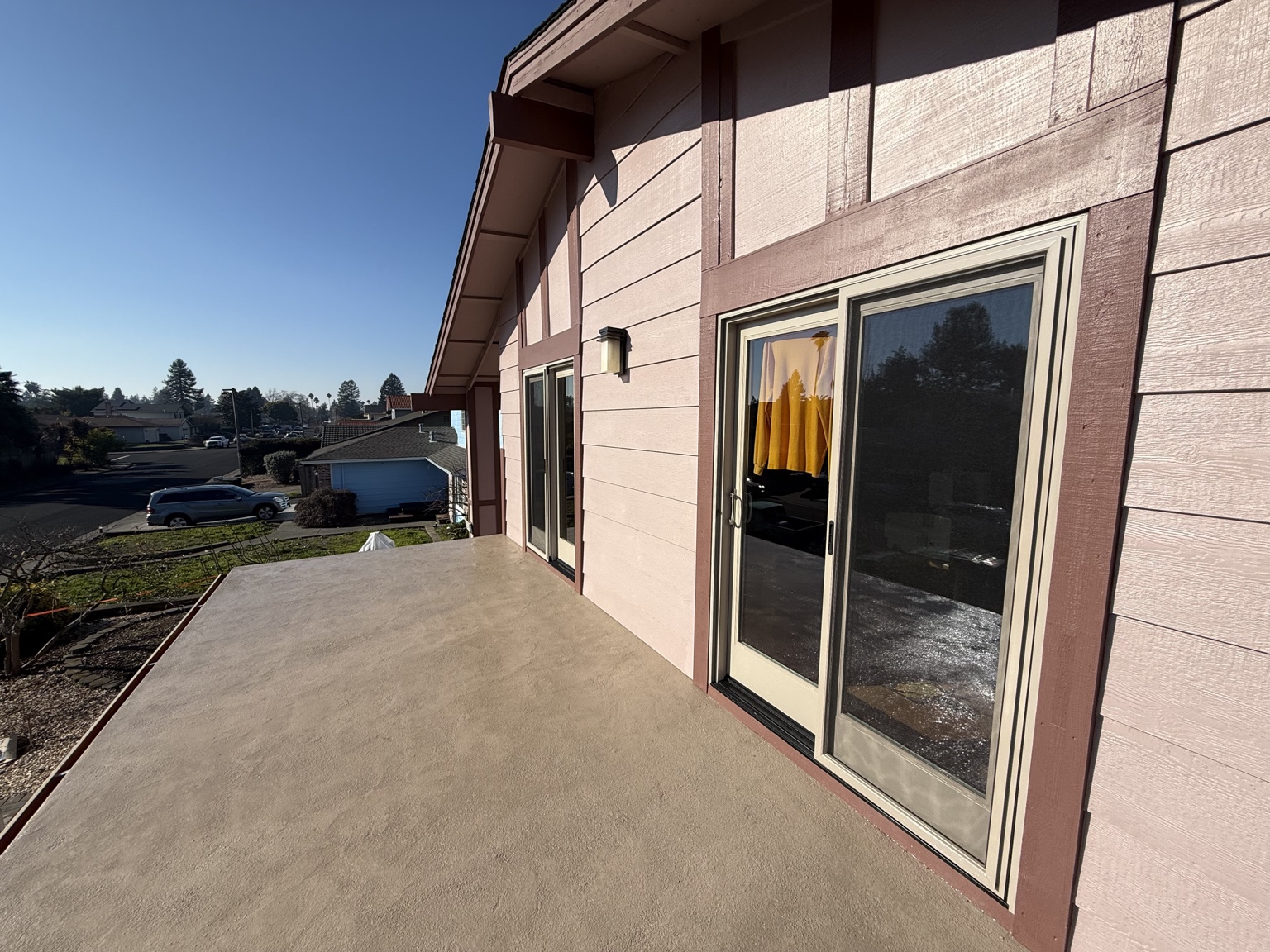 Finished exterior deck surface and doors